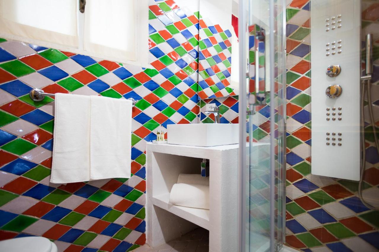 كالا غونوني Palmasera Charming Suites المظهر الخارجي الصورة