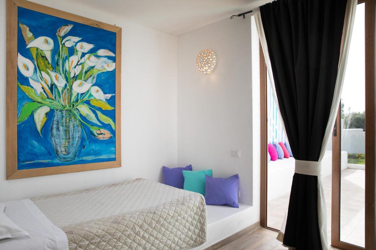 كالا غونوني Palmasera Charming Suites المظهر الخارجي الصورة