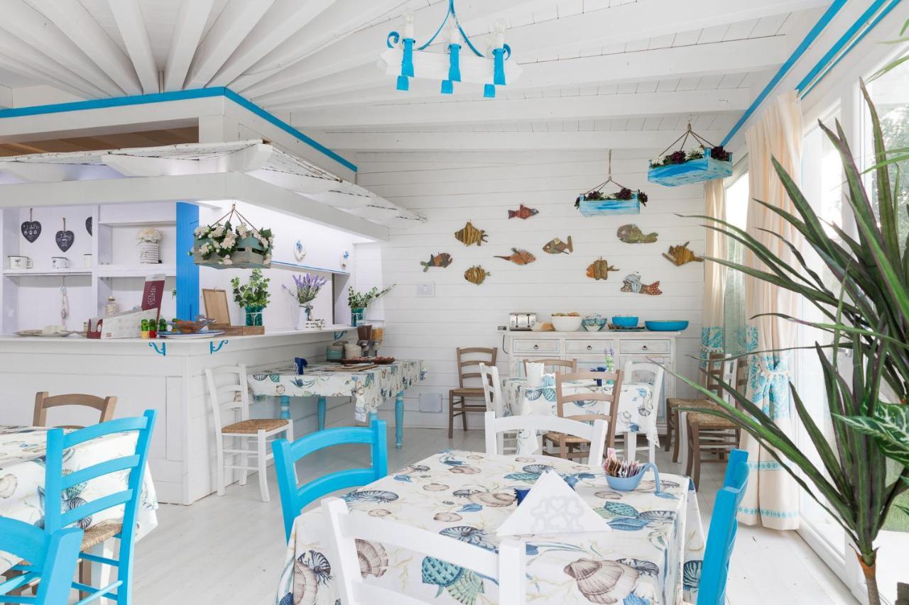 كالا غونوني Palmasera Charming Suites المظهر الخارجي الصورة
